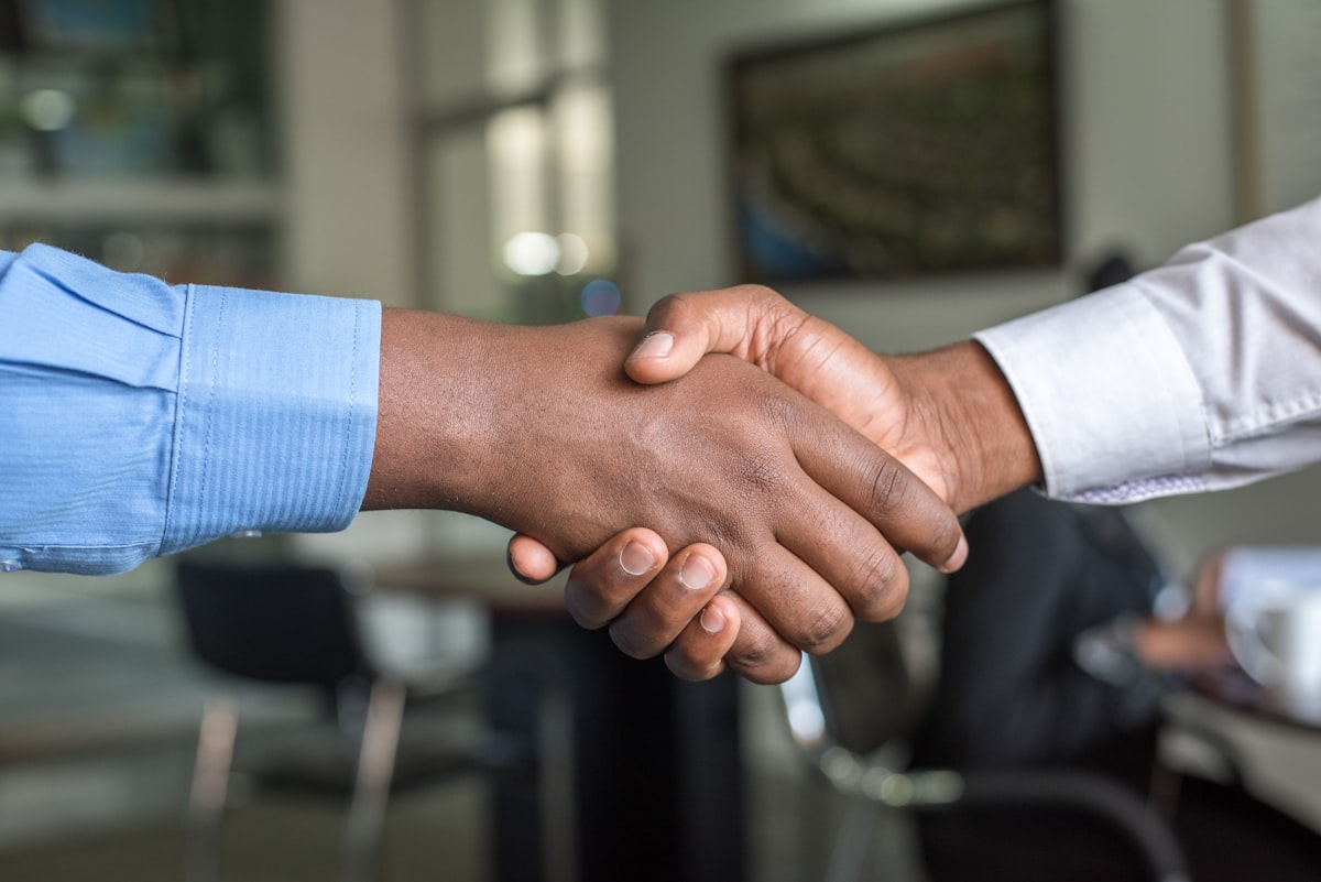 Professional front-of-house welcome in a corporate environment